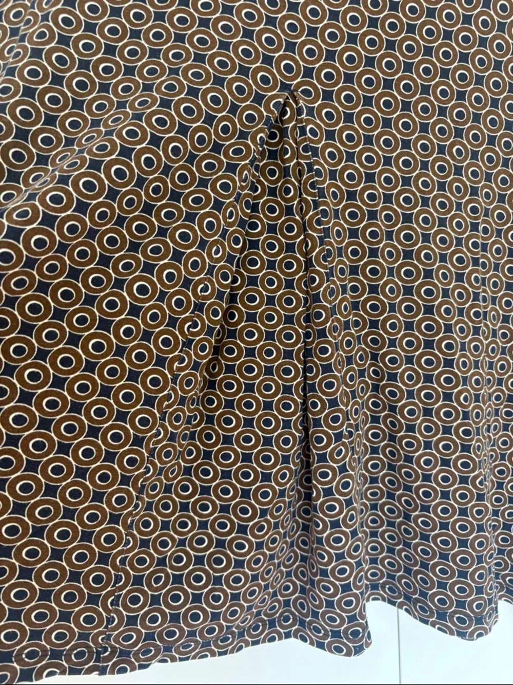 Boden jersey skirt with a brown and blue patterned design 12R